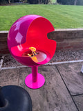 Pink bioethanol fireplace for modern living room spaces in garden